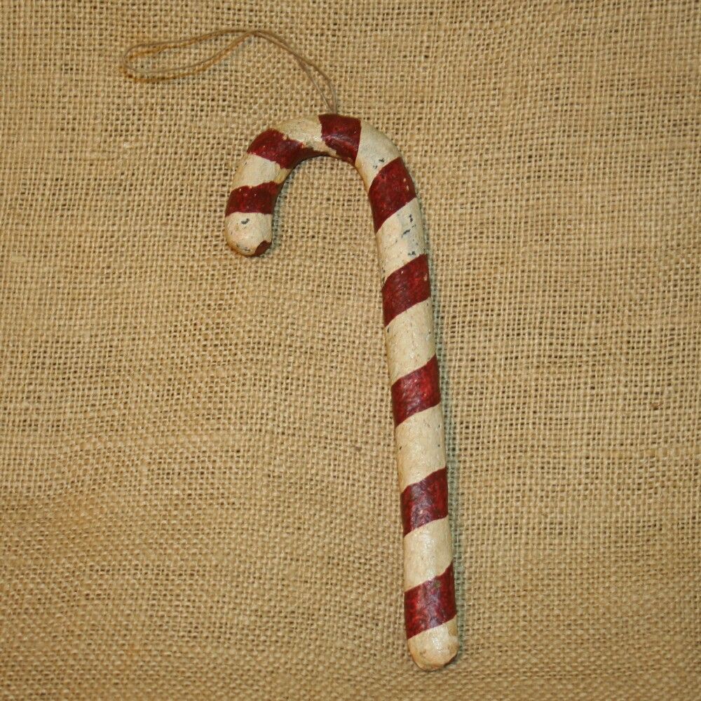 cane measure 9 inches long . There is a string on top to hang it